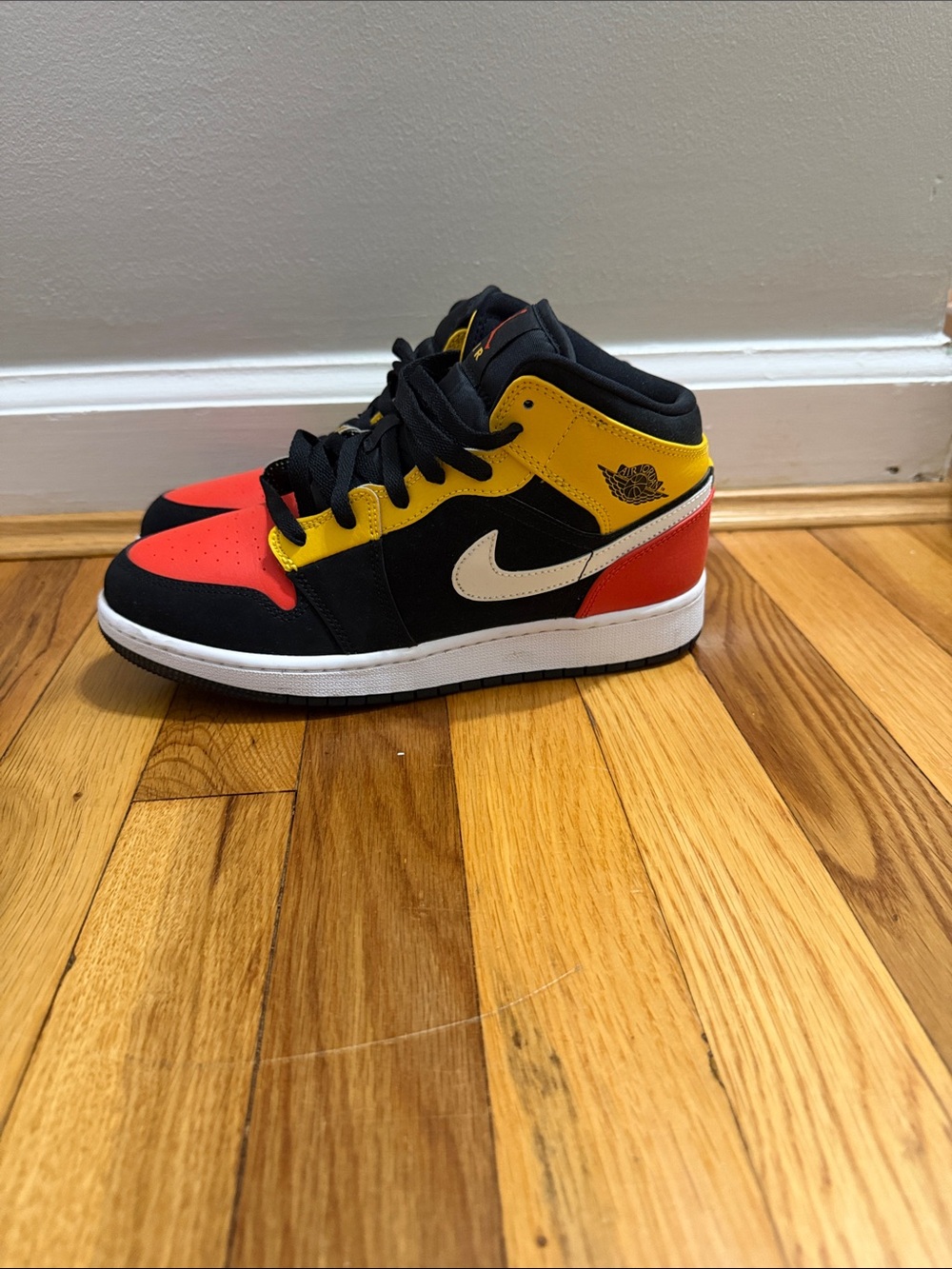 Nike Kids Mid-Top Sneakers in Black, Red, Yellow, White